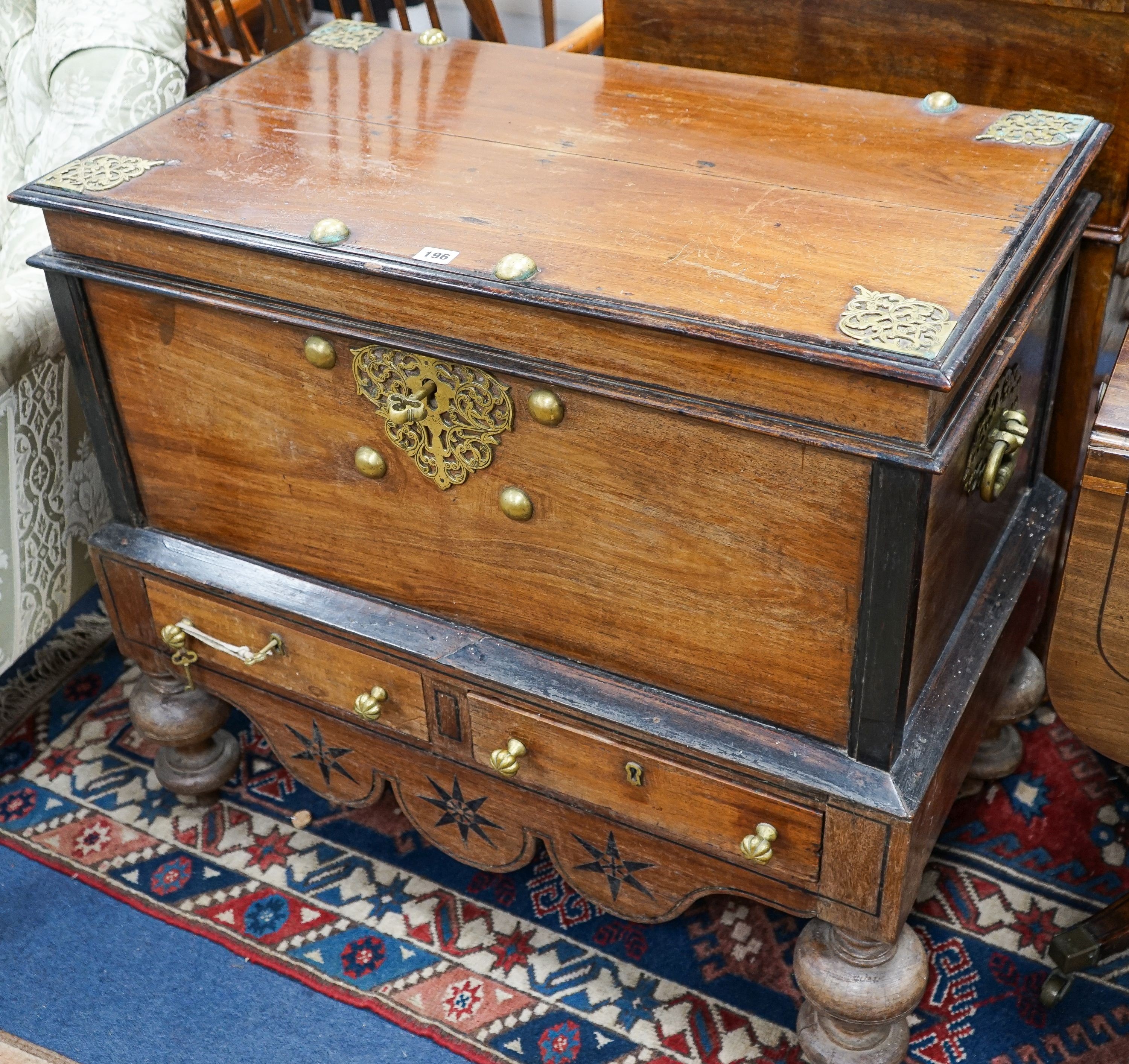 An Indonesian brass mounted hardwood coffer, length 88cm, depth 50cm, height 80cm